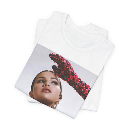 A black graphic t-shirt featuring a classic aesthetic graphic of Selena Gomez.