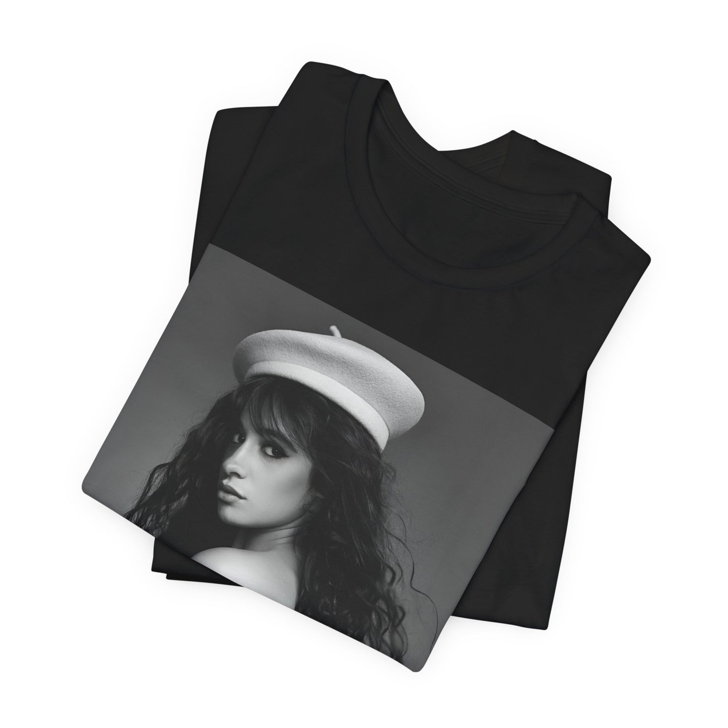 A black graphic t-shirt featuring a black and white graphic of Camila Cabello as a fierce Latina pop star.