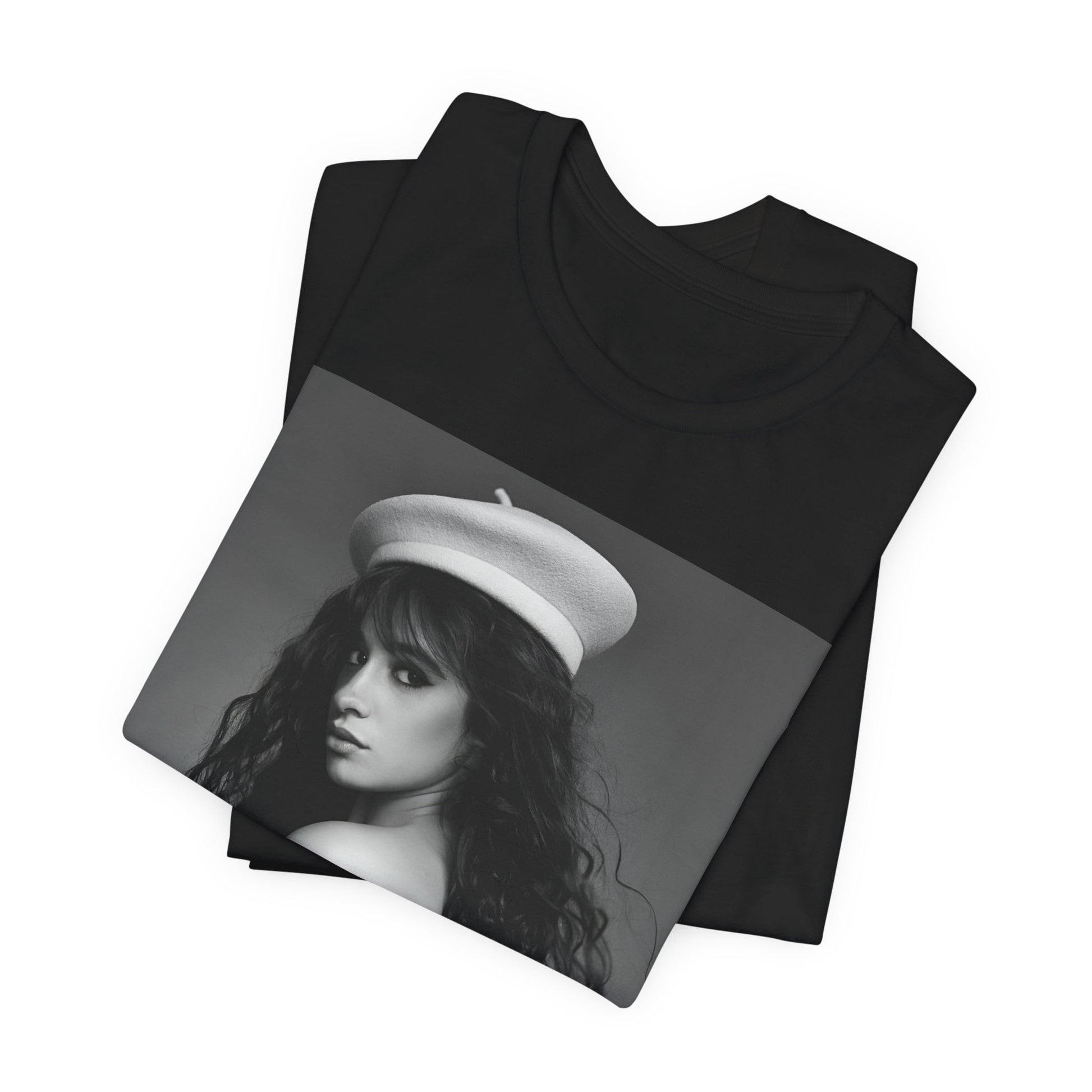 A black graphic t-shirt featuring a black and white graphic of Camila Cabello as a fierce Latina pop star.