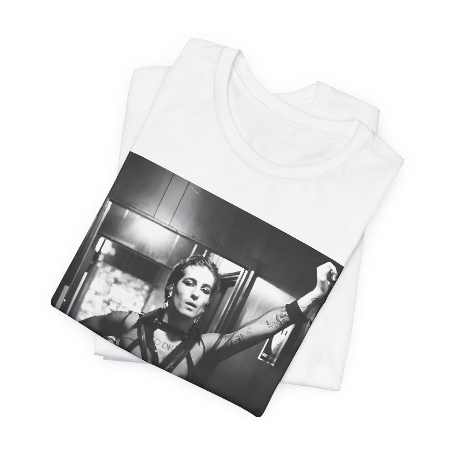 A black graphic t-shirt featuring a graphic of Maneskin emphasizing a rebel rock spirit.