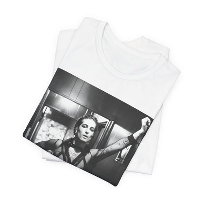 A black graphic t-shirt featuring a graphic of Maneskin emphasizing a rebel rock spirit.