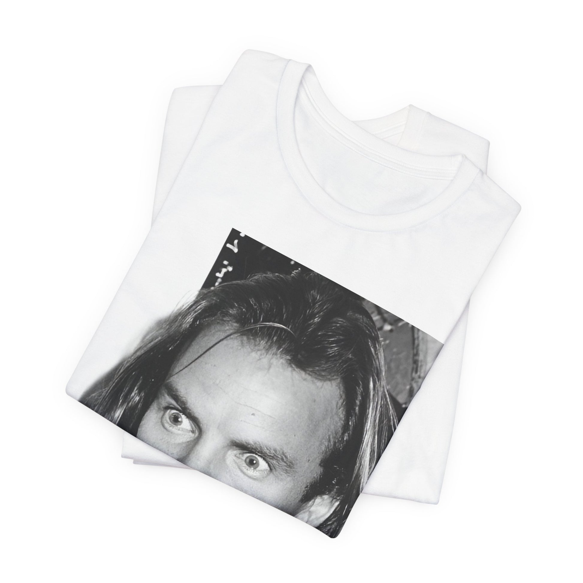 A black graphic t-shirt featuring a retro graphic related to Sting's 'Synchronicity' album era.