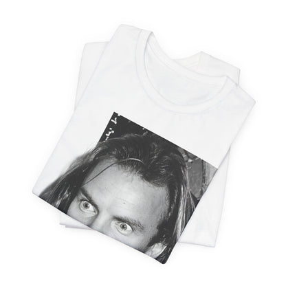 A black graphic t-shirt featuring a retro graphic related to Sting's 'Synchronicity' album era.