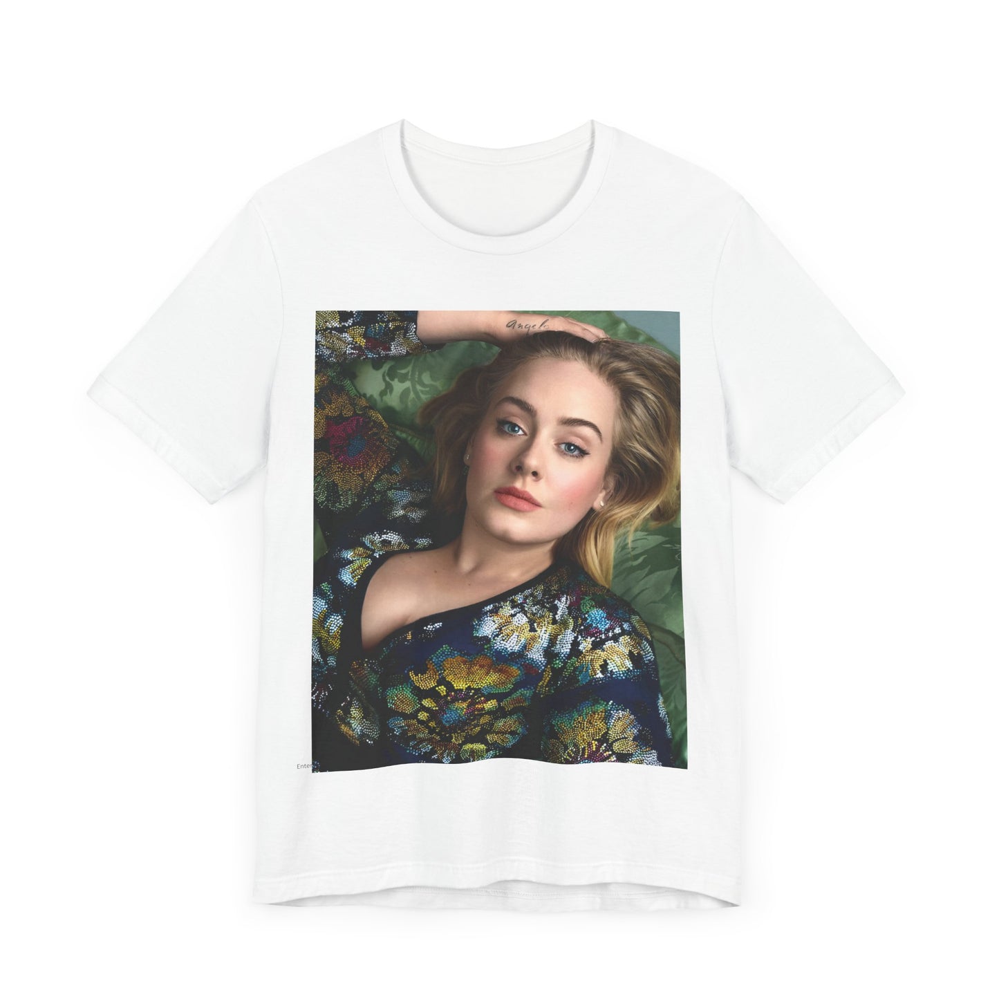 A black graphic t-shirt featuring a photo of Adele, possibly with floral elements or a floral background, showing a serene or contemplative expression.