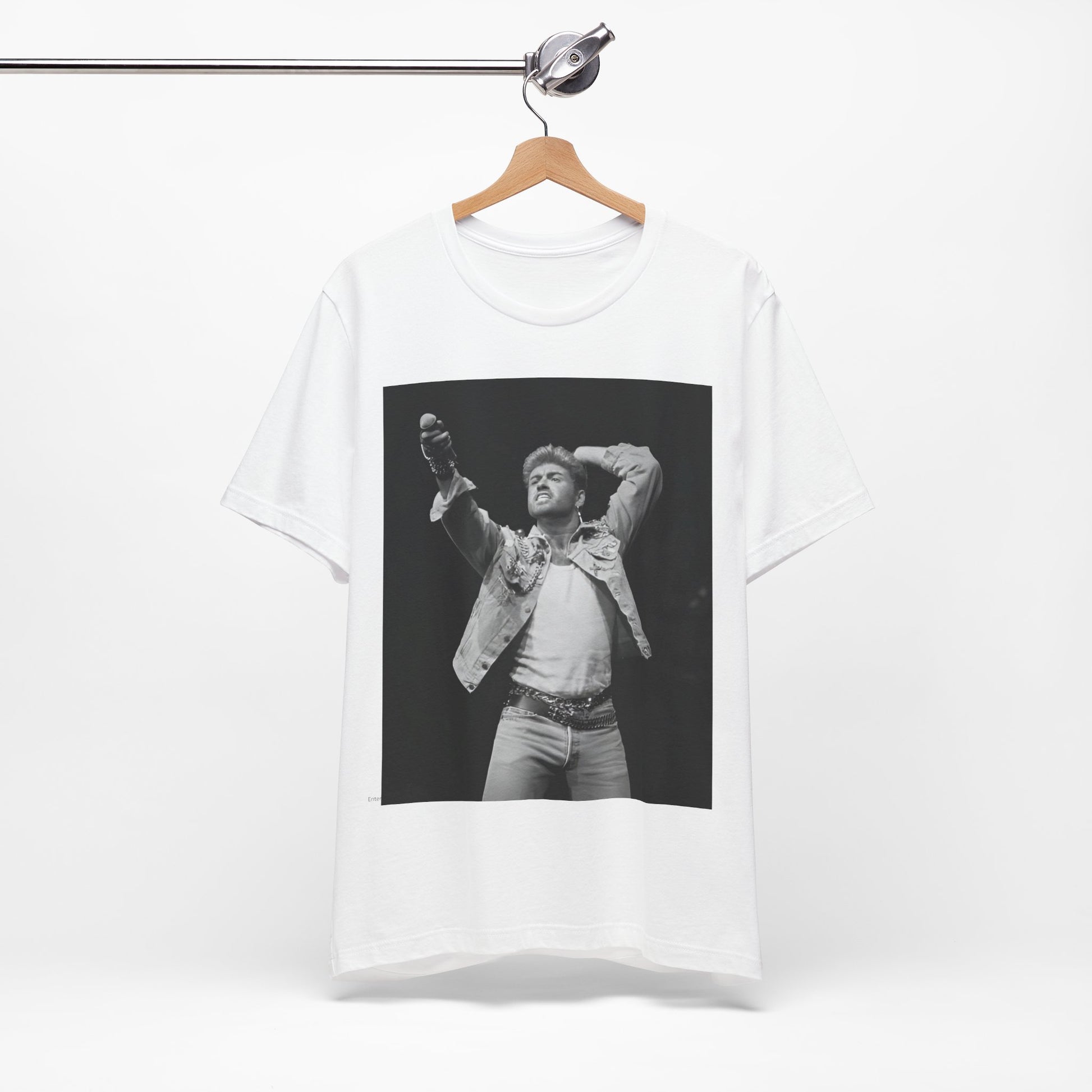 A black graphic t-shirt featuring a graphic or photo of George Michael performing live on stage.