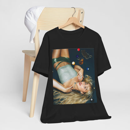 A black graphic t-shirt featuring a vintage pop icon graphic of Sabrina Carpenter.