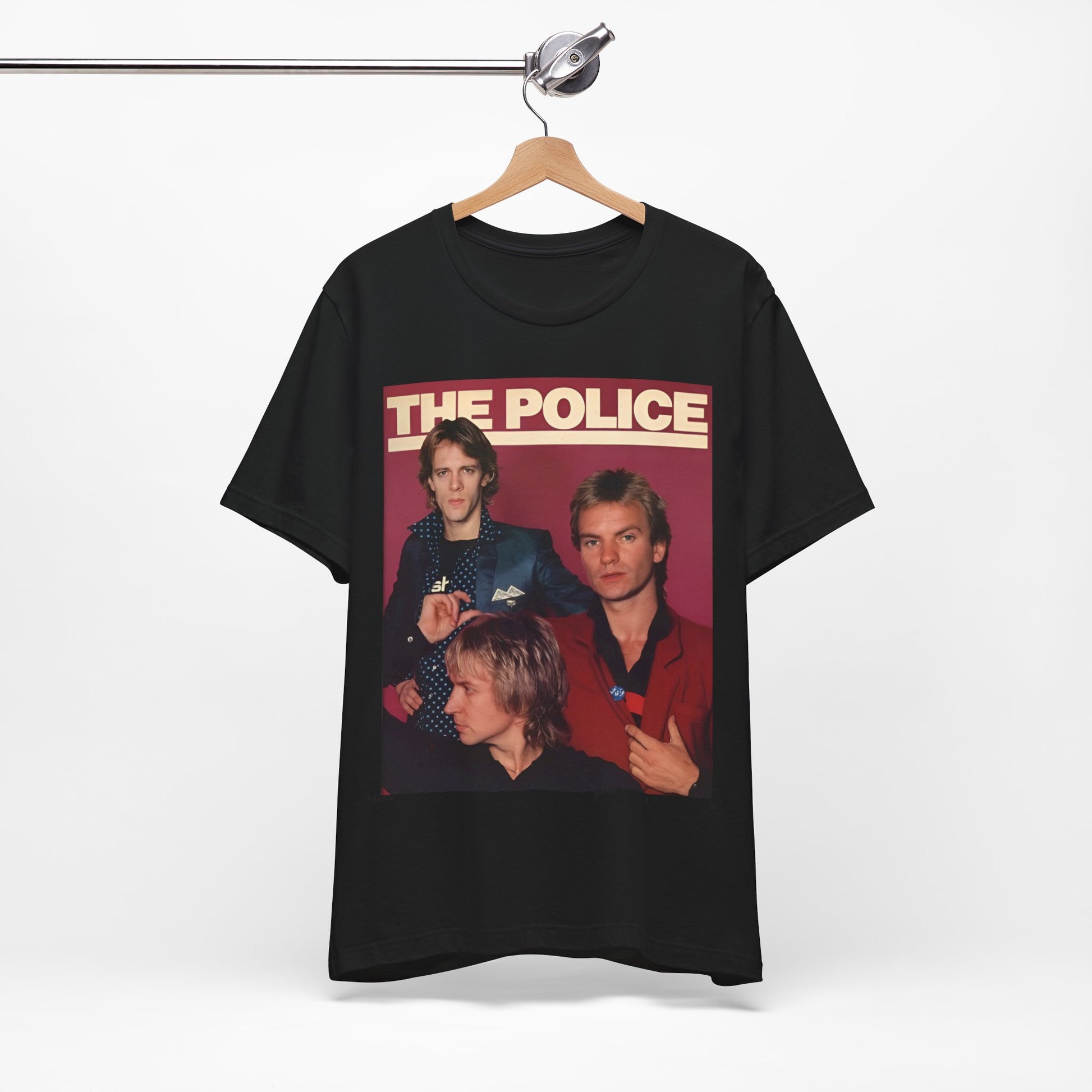 A black graphic t-shirt featuring a minimalist graphic of The Police as a power trio.