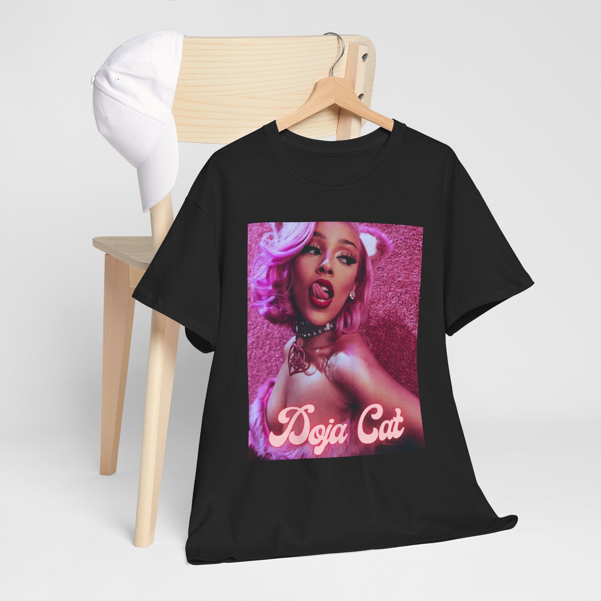 A black graphic t-shirt featuring a graphic of Doja Cat as a rap star with an aesthetic design.