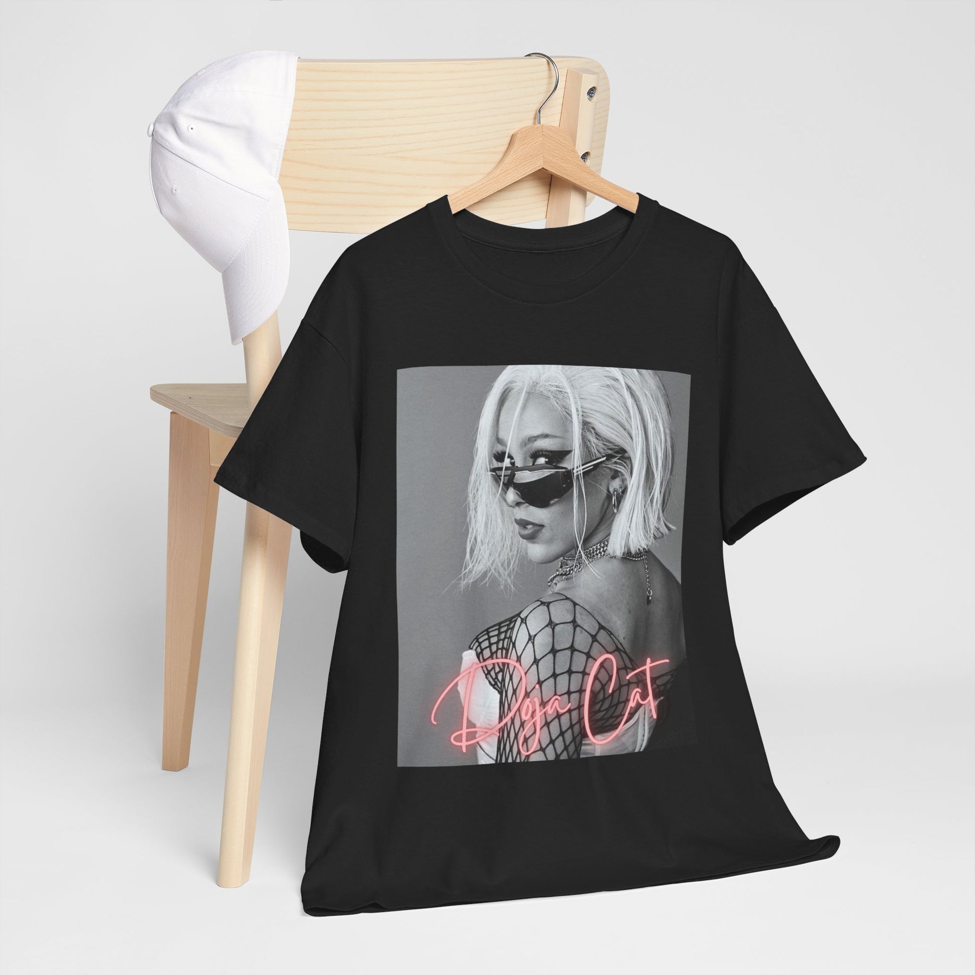 A black graphic t-shirt featuring a black and white portrait photo of Doja Cat.