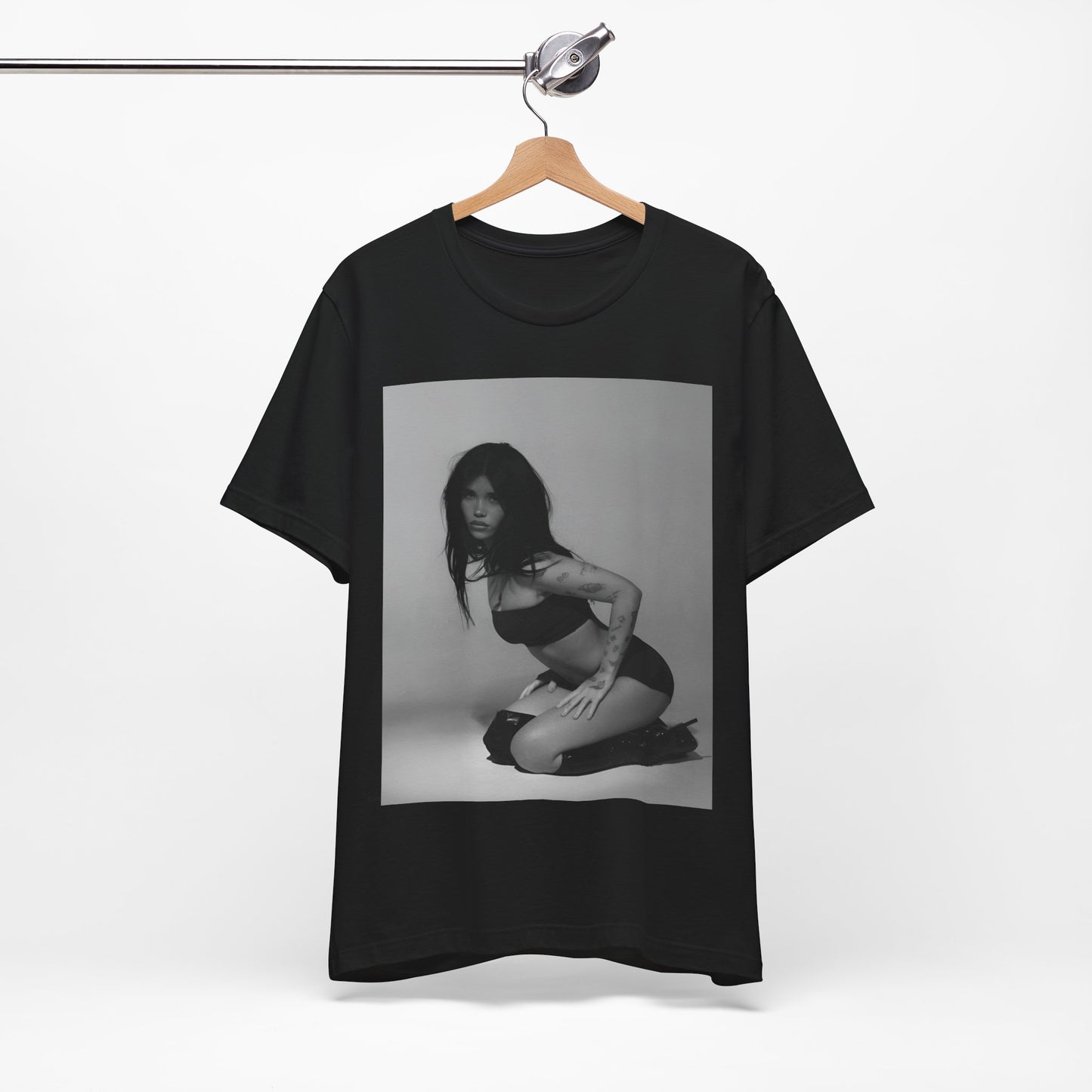 A black graphic t-shirt featuring a black and white, monochrome graphic or photo of Nessa Barrett.