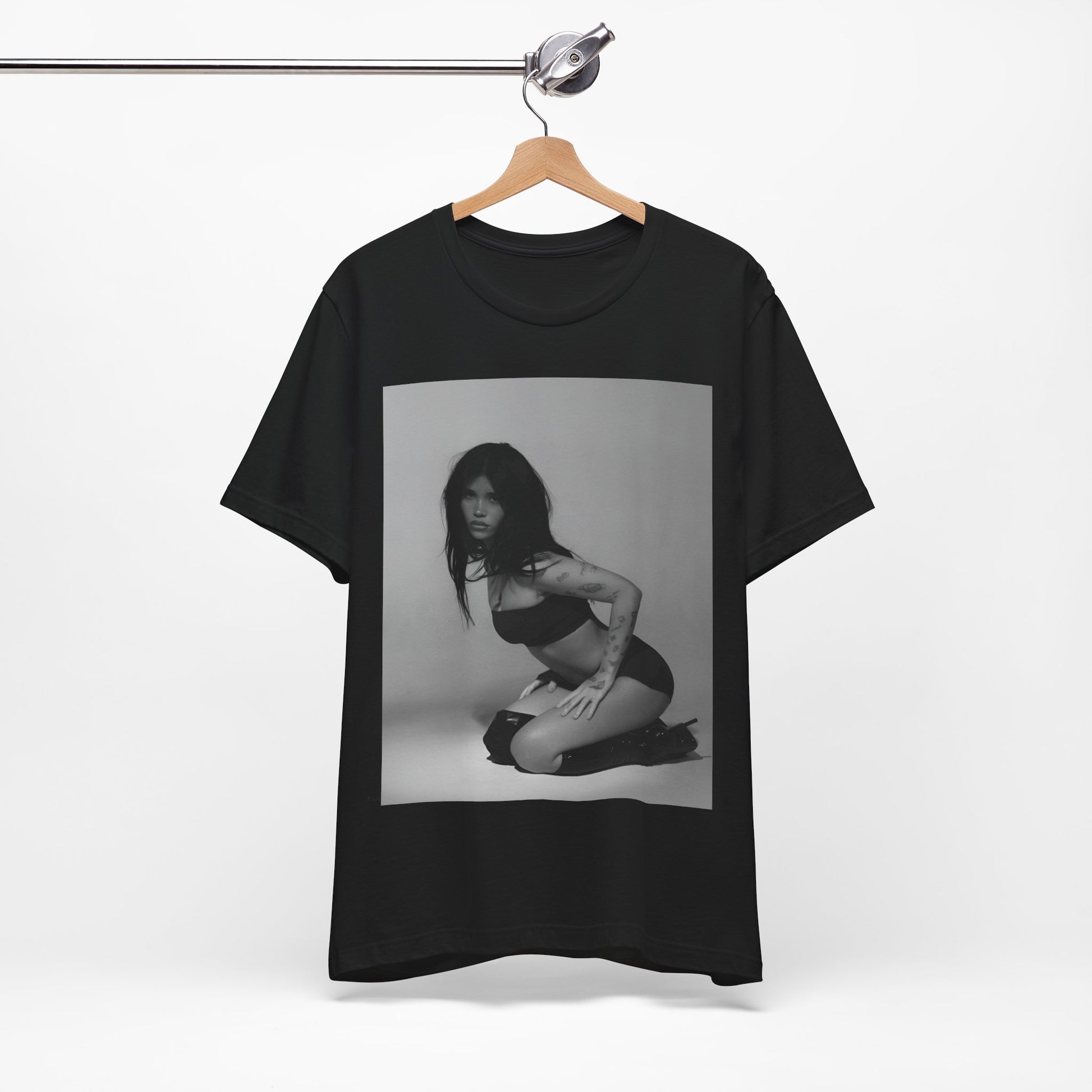 A black graphic t-shirt featuring a black and white, monochrome graphic or photo of Nessa Barrett.
