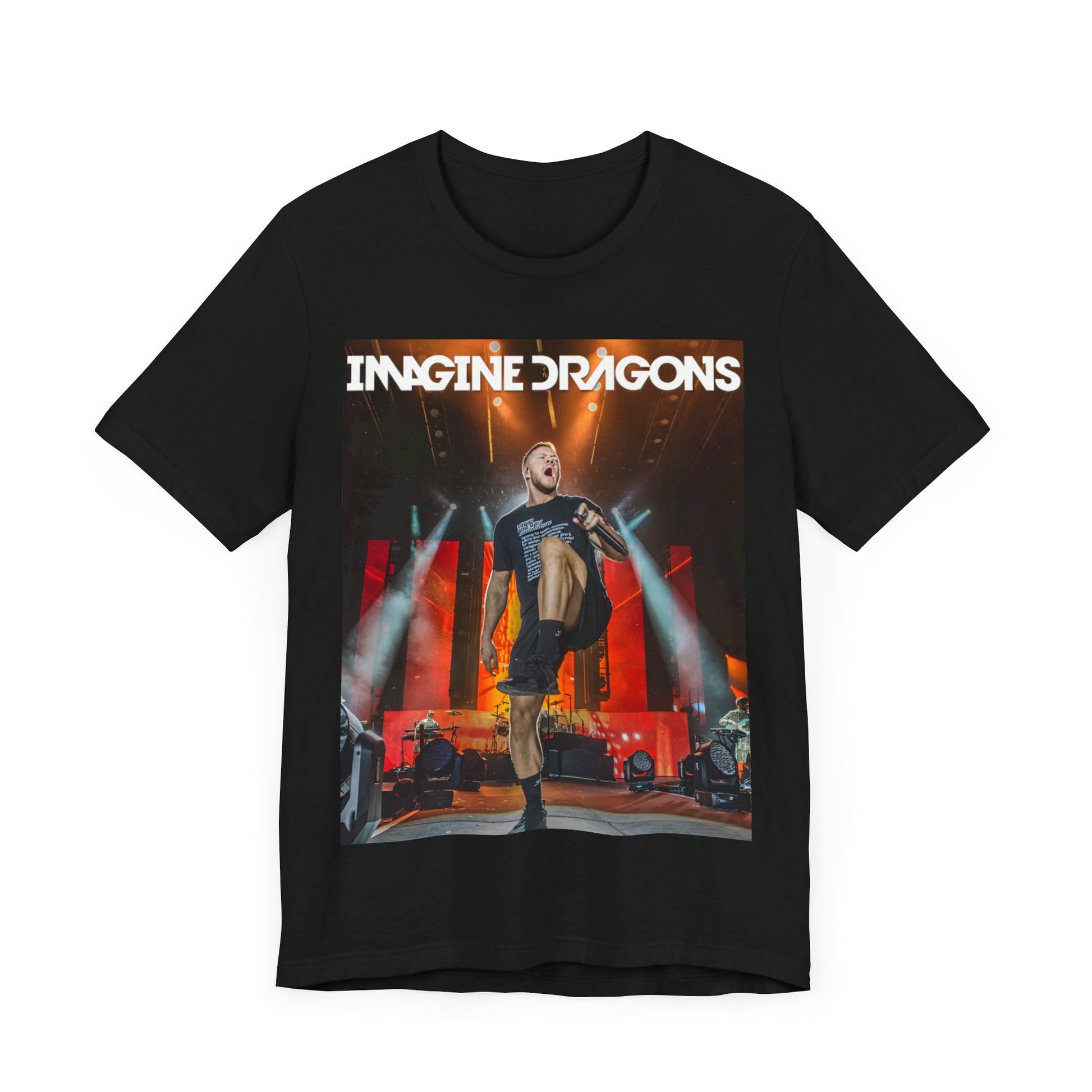 A black graphic t-shirt featuring a graphic or photo of Imagine Dragons performing live on stage.