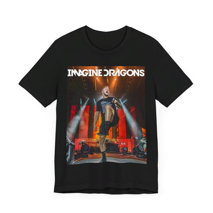 A black graphic t-shirt featuring a graphic or photo of Imagine Dragons performing live on stage.