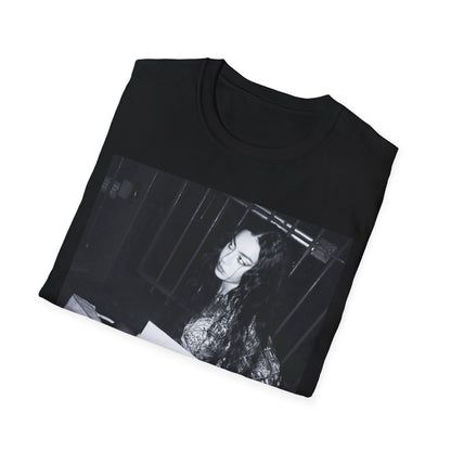 A black graphic t-shirt featuring a graphic related to Charli XCX's 'Brat' album.