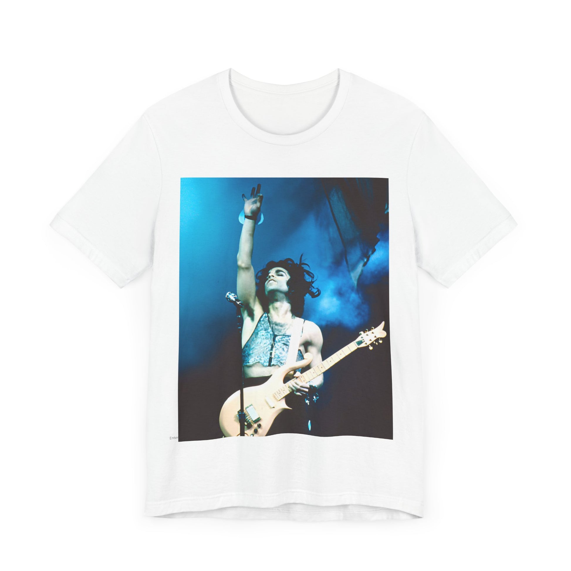 A black graphic t-shirt featuring a graphic of Prince as a guitar god and virtuoso performer.