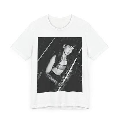 A black graphic t-shirt featuring a black and white, monochrome graphic or portrait of Dua Lipa.
