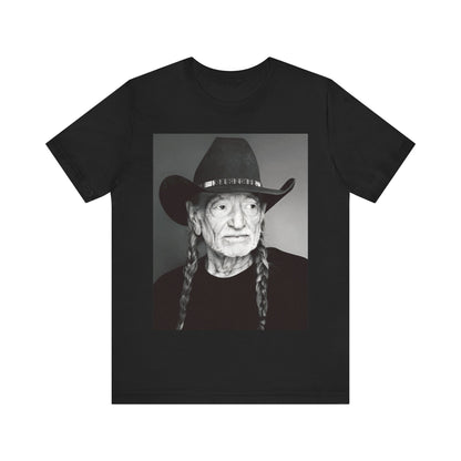 A black graphic t-shirt featuring a graphic of Willie Nelson with his iconic guitar 'Trigger'.