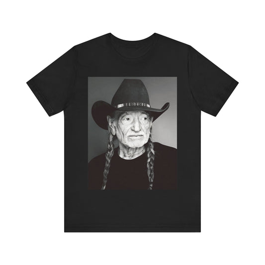 A black graphic t-shirt featuring a graphic of Willie Nelson with his iconic guitar 'Trigger'.