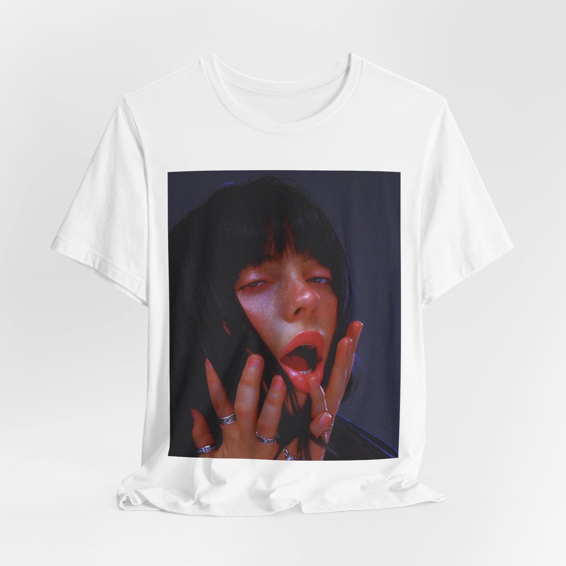 An intense, artistic photo of Billie Eilish with a bloody nose, conveying a sense of raw power, printed on a graphic t-shirt.