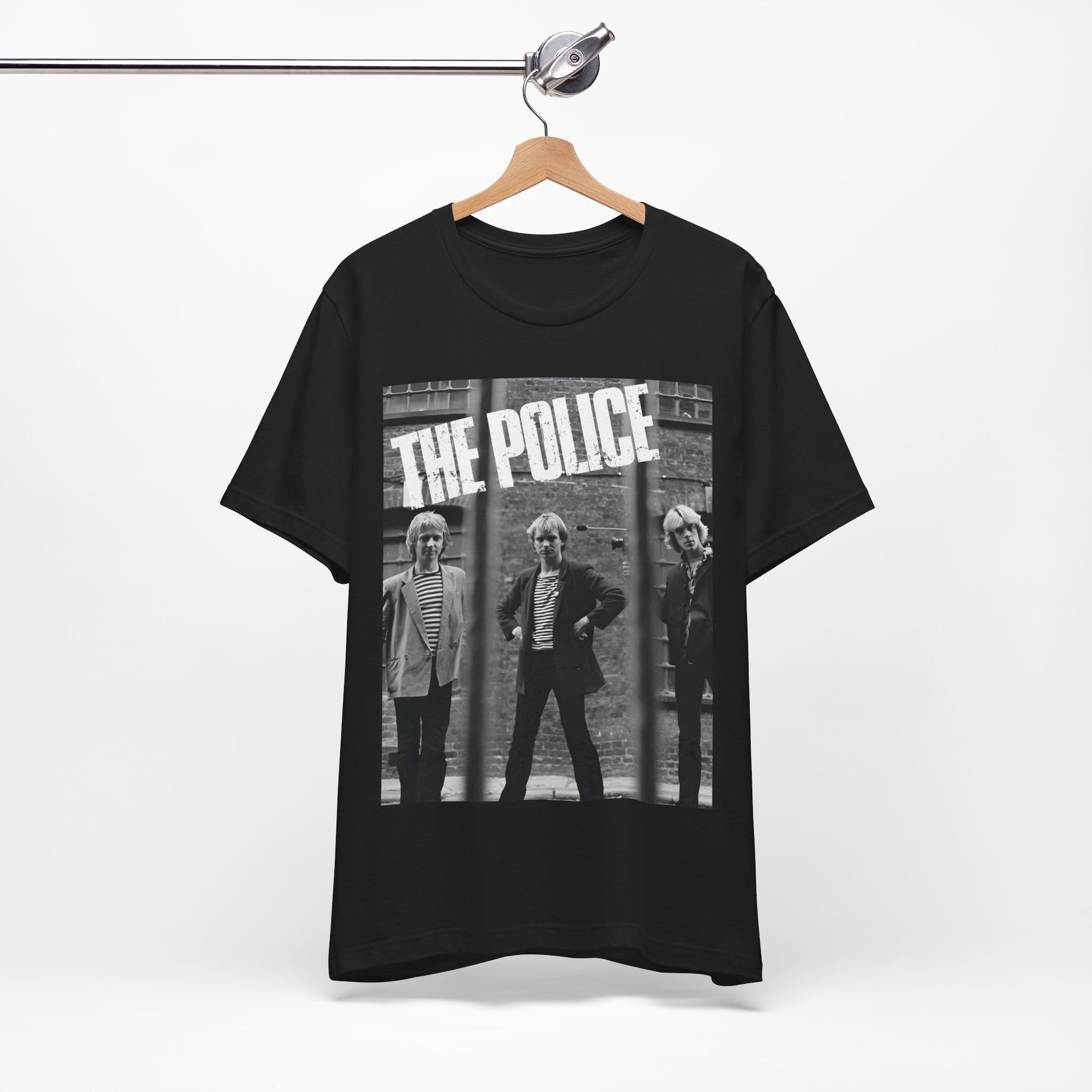 A black graphic t-shirt featuring a vintage new wave icon graphic of The Police.