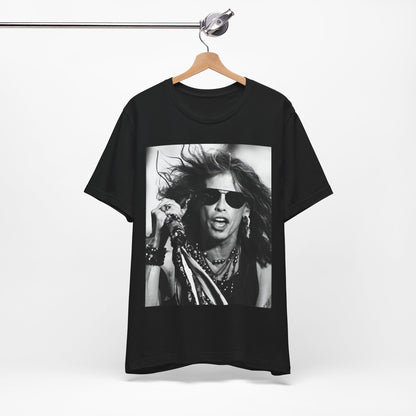 A black graphic t-shirt featuring a black and white photo of Aerosmith's Steven Tyler with his signature scarf and microphone, captured during a dynamic performance.