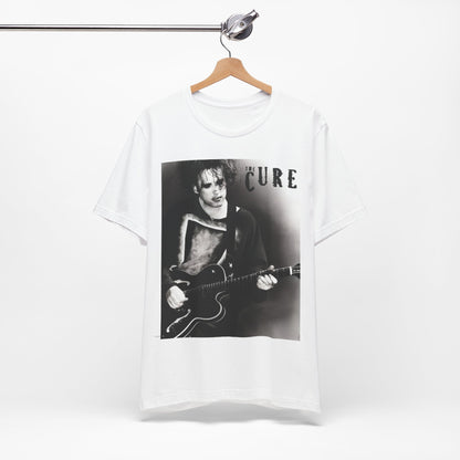 A black graphic t-shirt featuring a vintage goth rock graphic of The Cure.