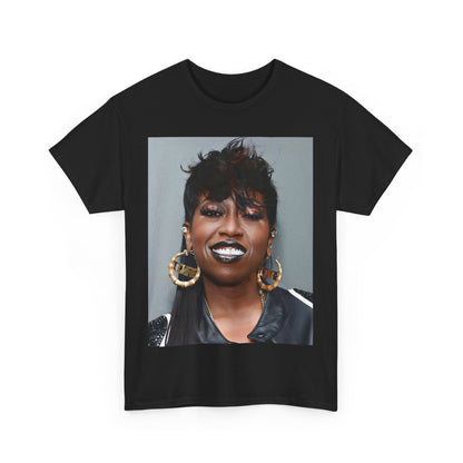A black graphic t-shirt featuring a bold graphic of Missy Elliott as a rap superstar.