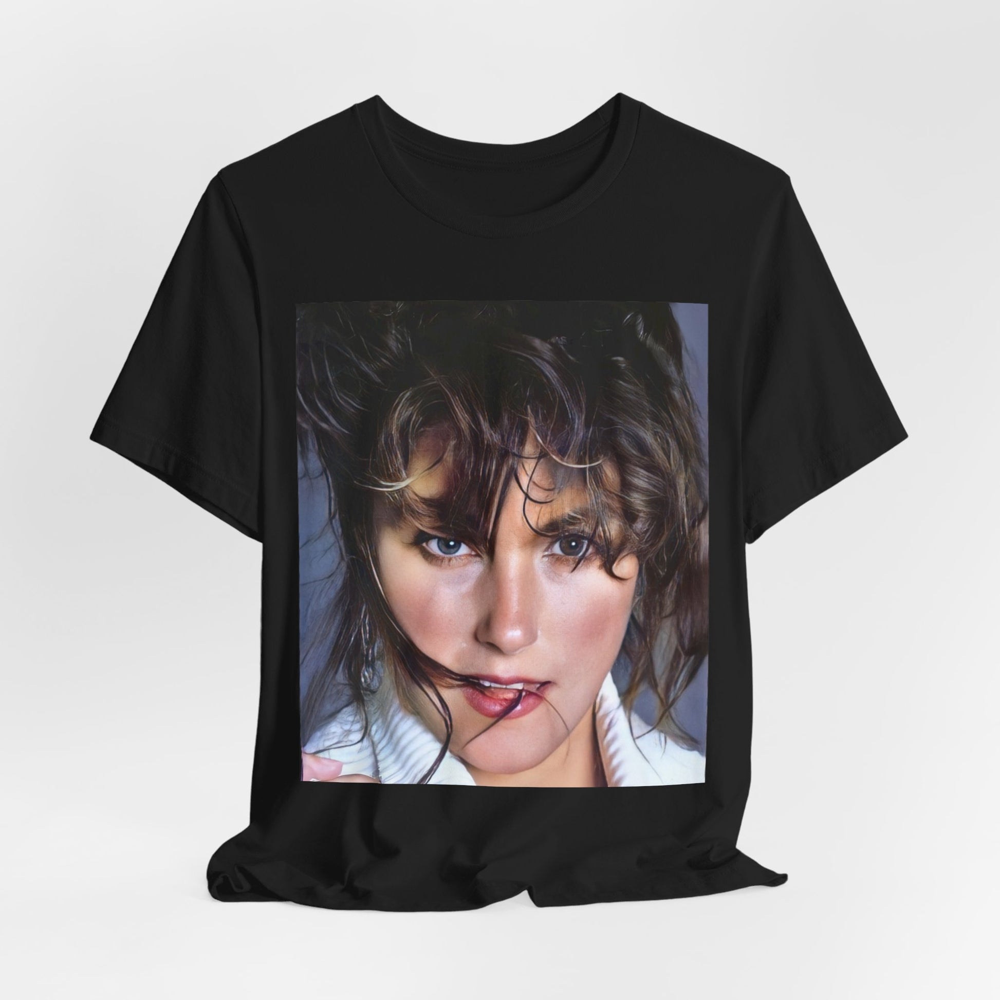 A black graphic t-shirt featuring an 80s style graphic of Laura Branigan.