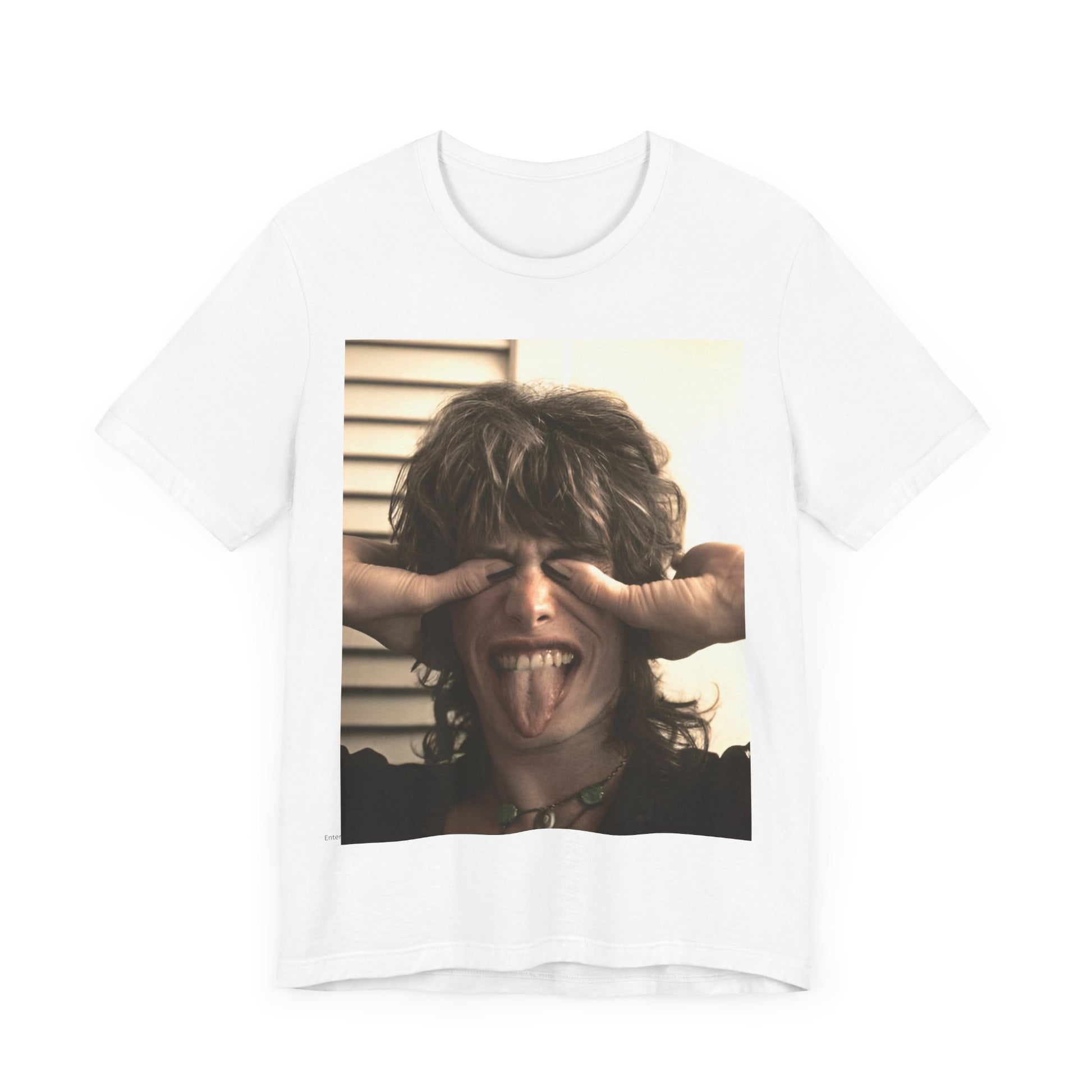 A black graphic t-shirt featuring a vintage 70s band photo of Aerosmith, showing the members in their iconic early looks.