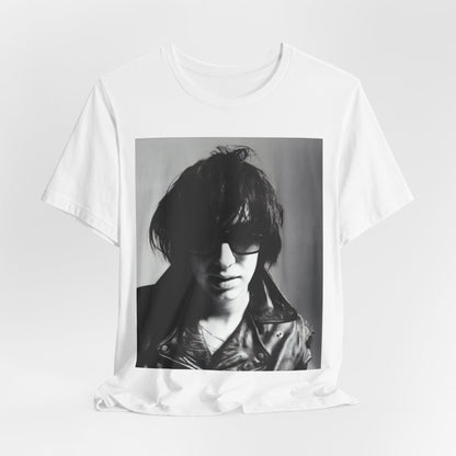 A black graphic t-shirt featuring a graphic related to The Strokes' 'Reptilia' song or era.
