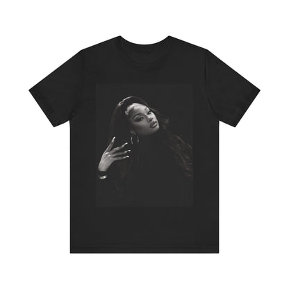 A black graphic t-shirt featuring a black and white, monochrome graphic or photo of Megan Thee Stallion.