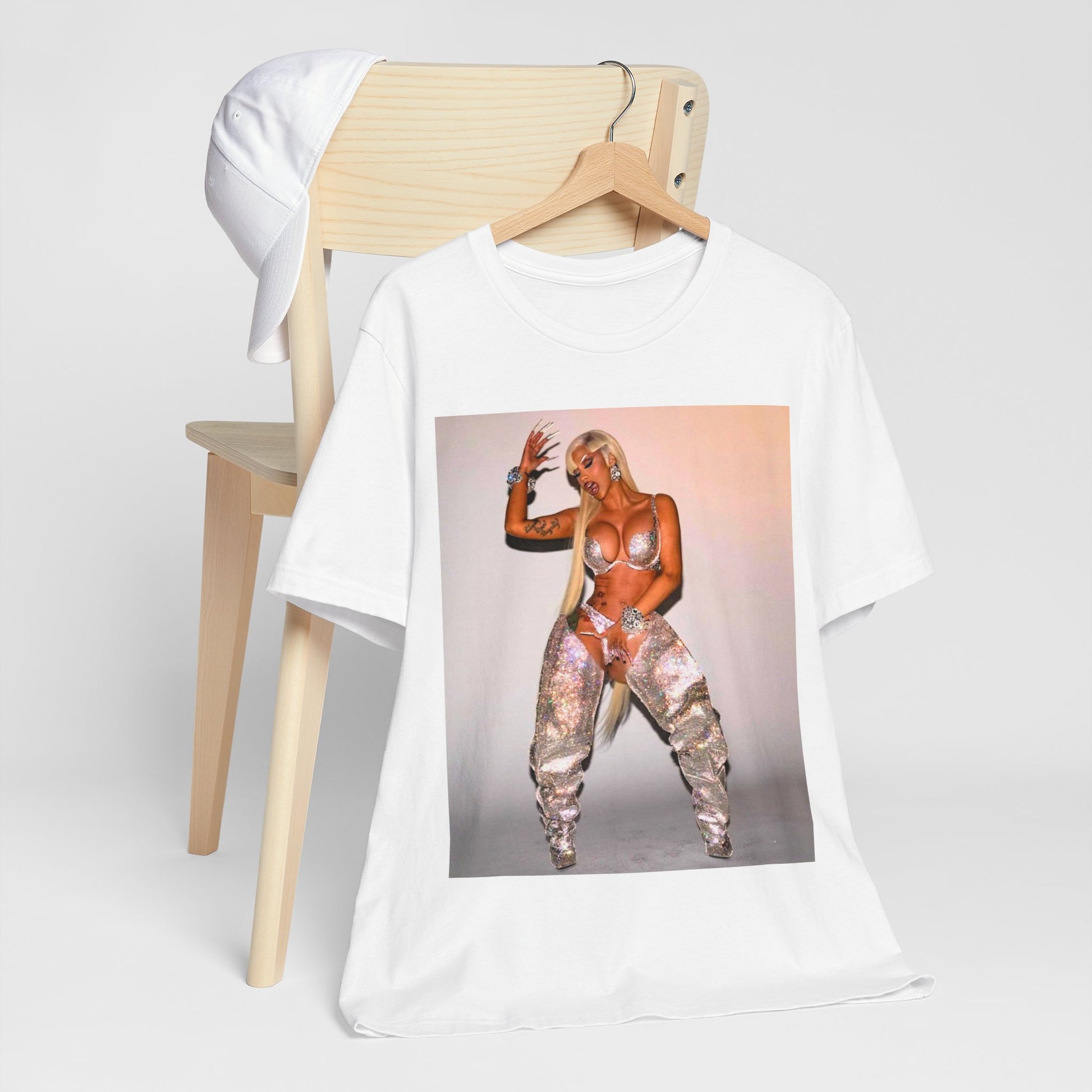 A black graphic t-shirt featuring a vintage graphic of Cardi B as a 'Bronx Queen' or rap icon.
