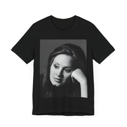 A black graphic t-shirt featuring a vintage-style black and white studio portrait of Adele, showing her with a poised and elegant expression.