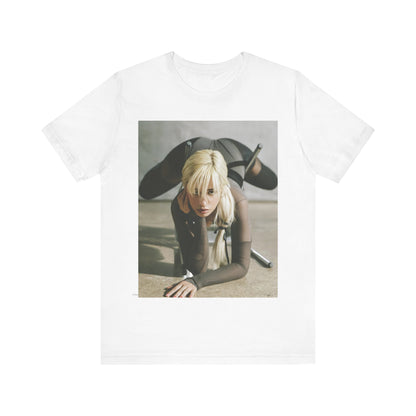 A black graphic t-shirt featuring a vintage-style graphic of Camila Cabello, possibly with a crown or 'Pop Queen' title.