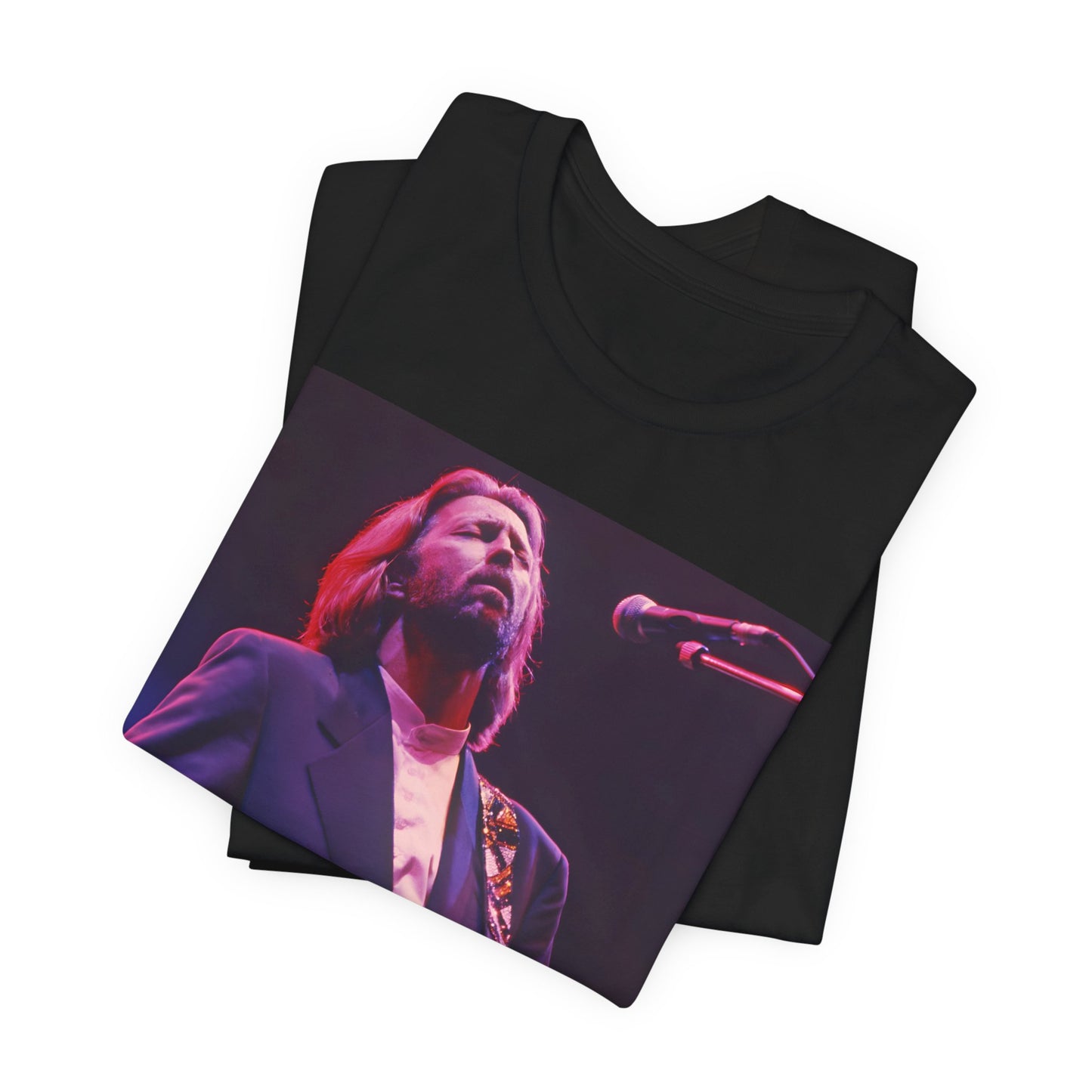 A black graphic t-shirt featuring a vintage graphic of Eric Clapton as a blues rock icon.