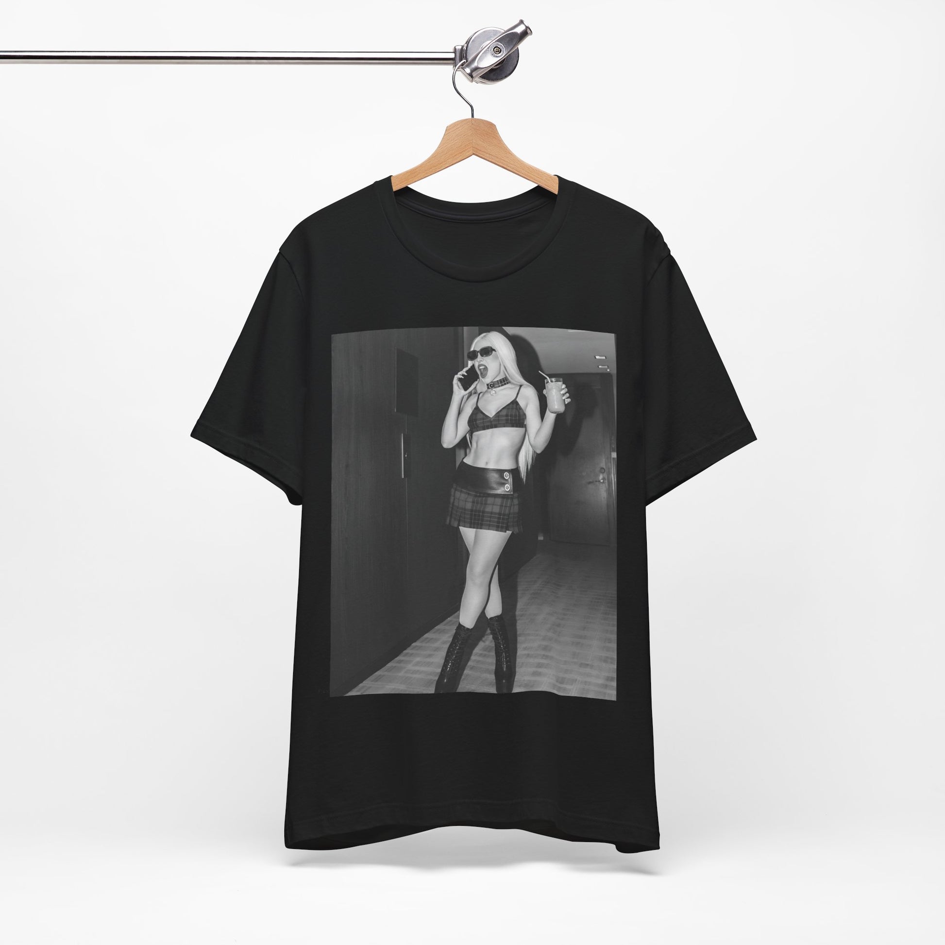 A black graphic t-shirt featuring a graphic of Ava Max with a 'rebel chic' or edgy pop aesthetic.