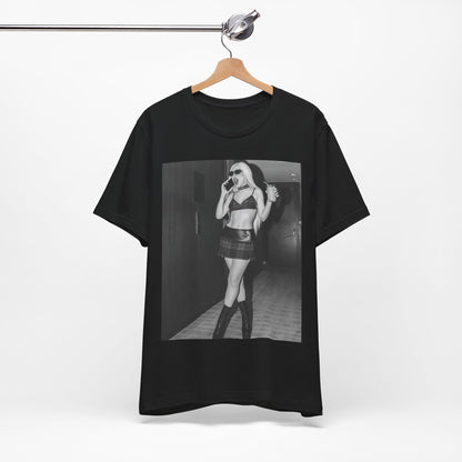 A black graphic t-shirt featuring a graphic of Ava Max with a 'rebel chic' or edgy pop aesthetic.