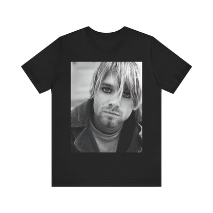 A black graphic t-shirt featuring a classic 90s alt rock graphic of Nirvana.