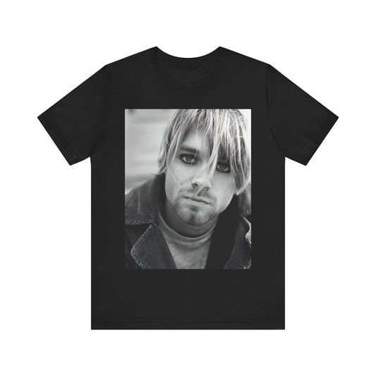 A black graphic t-shirt featuring a classic 90s alt rock graphic of Nirvana.