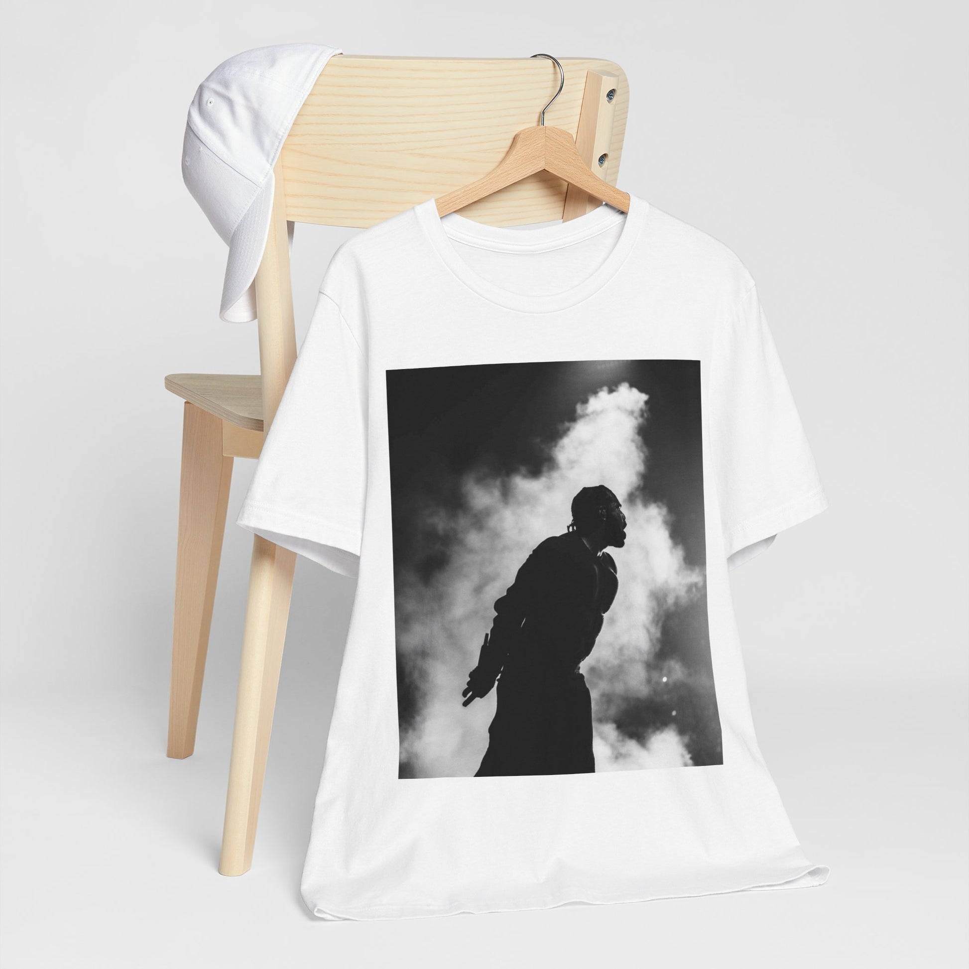 A black graphic t-shirt featuring a timeless black and white graphic or photo portrait of Drake.