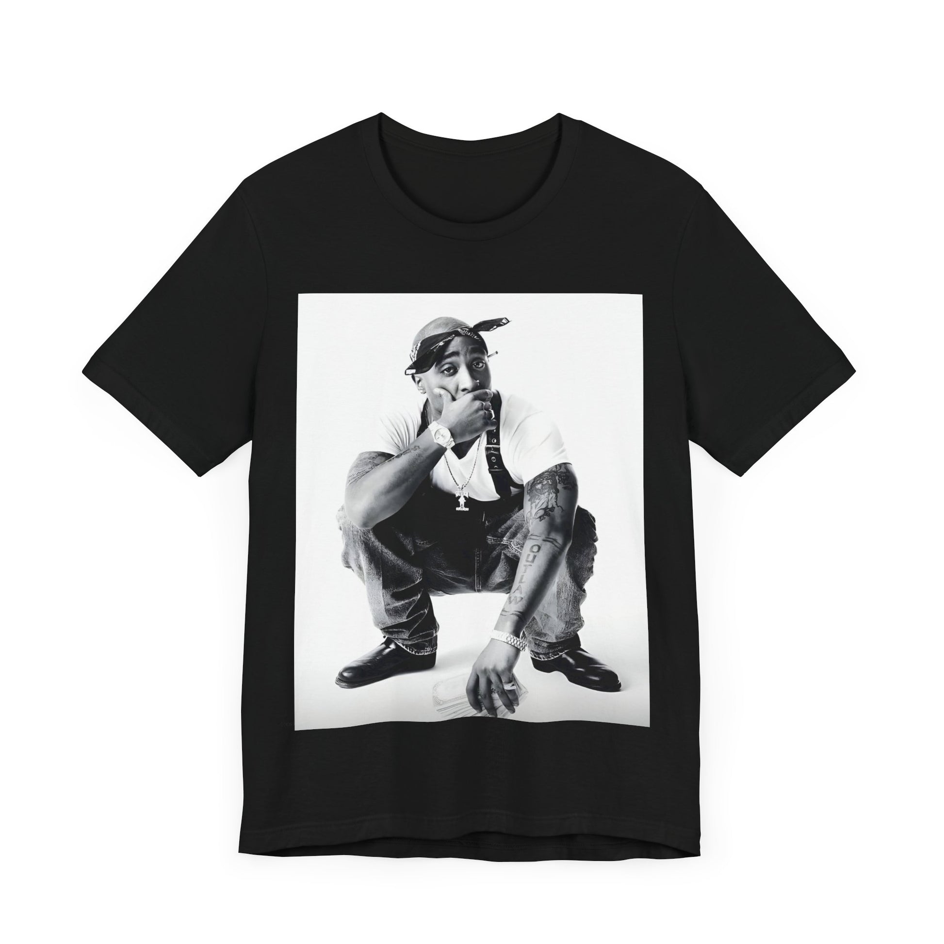 A black graphic t-shirt featuring a graphic of Tupac with a conscious rap vibe.