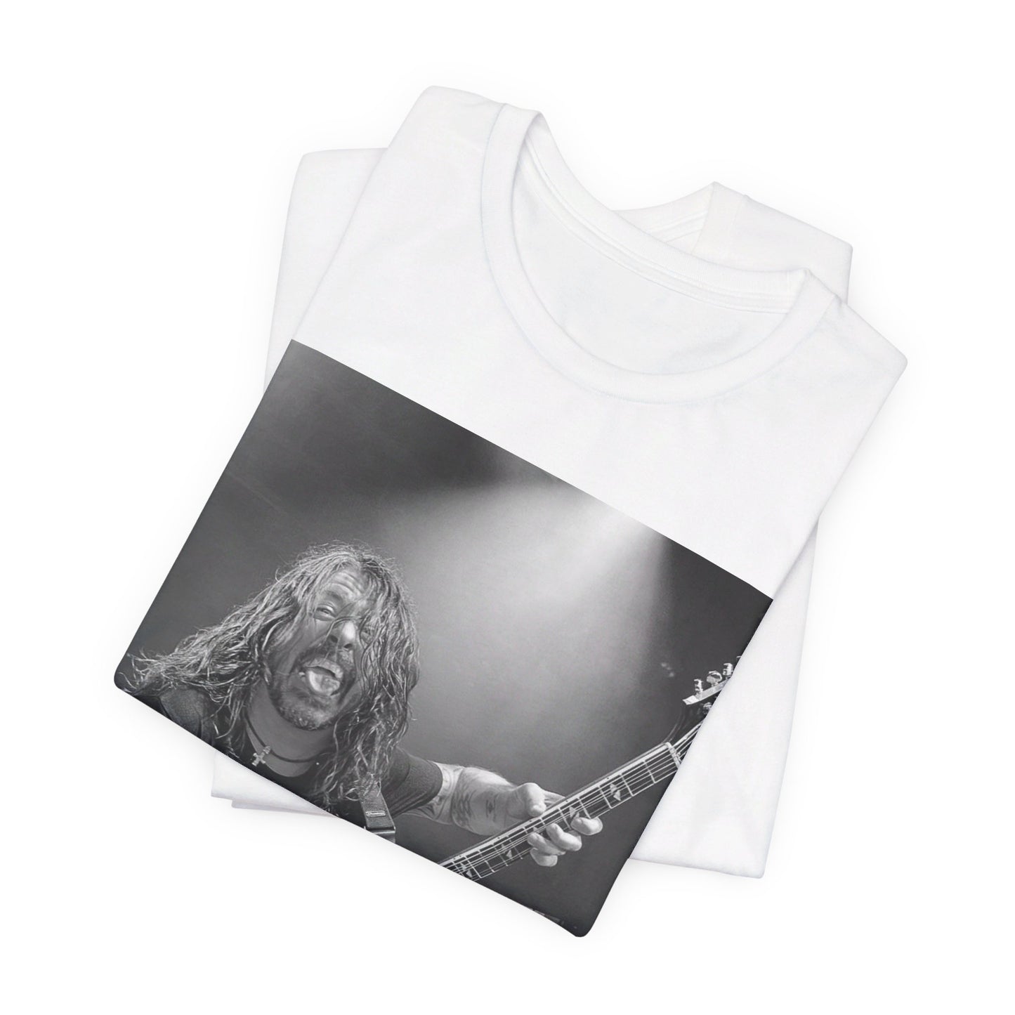 A black graphic t-shirt featuring a graphic of Dave Grohl from Foo Fighters playing guitar in concert.