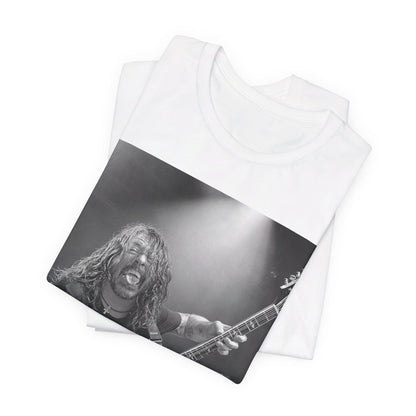 A black graphic t-shirt featuring a graphic of Dave Grohl from Foo Fighters playing guitar in concert.
