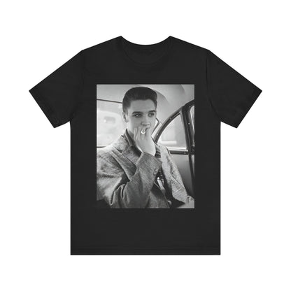 A black graphic t-shirt featuring a classic 50s era graphic of Elvis Presley.