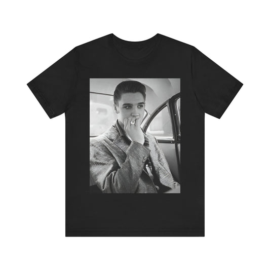 A black graphic t-shirt featuring a classic 50s era graphic of Elvis Presley.