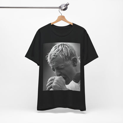 A black graphic t-shirt featuring a graphic or photo of Chester Bennington from Linkin Park performing live on stage.