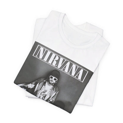 A black graphic t-shirt featuring a 90s rock rebels graphic of Nirvana.