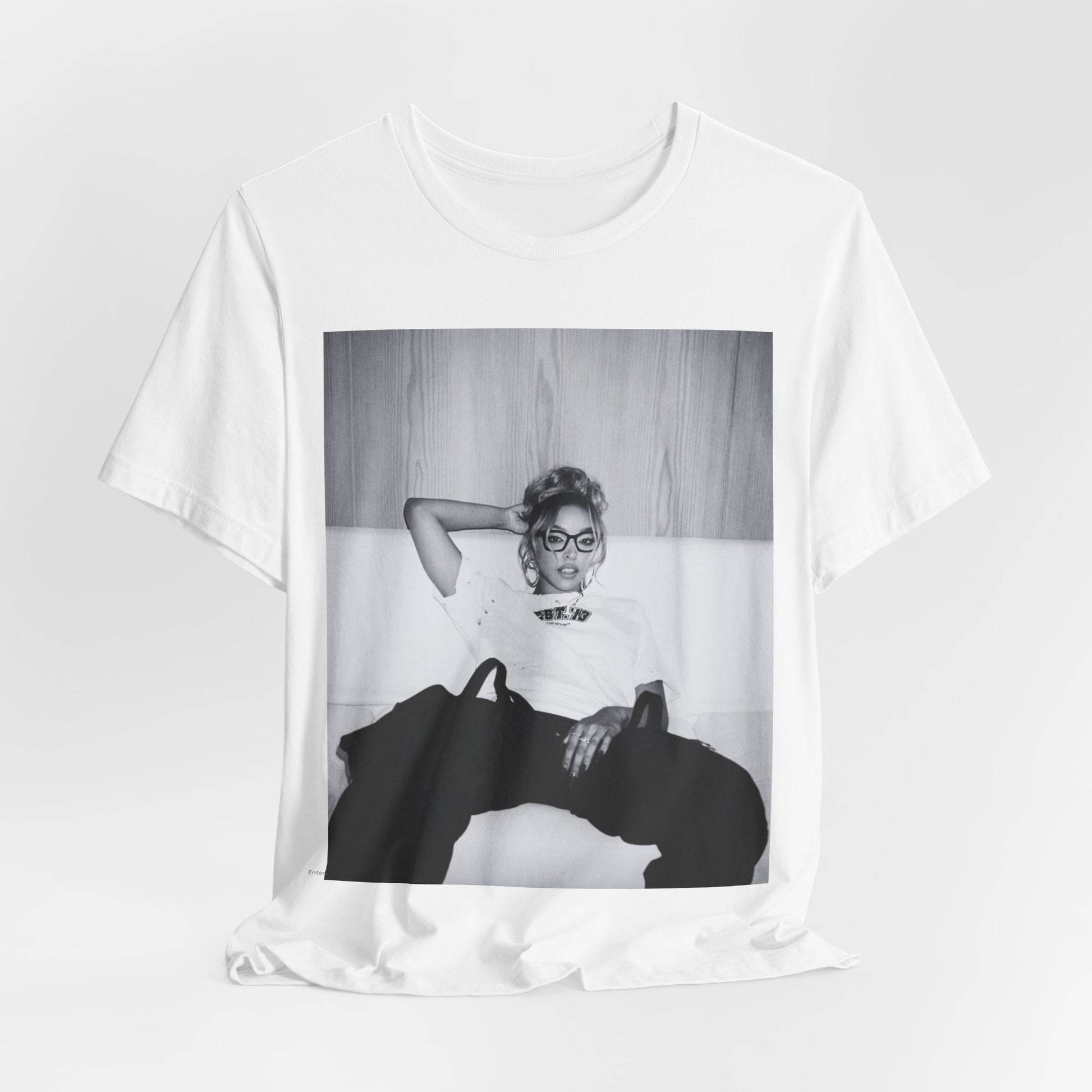 A black graphic t-shirt featuring a black and white portrait photo of Tinashe.