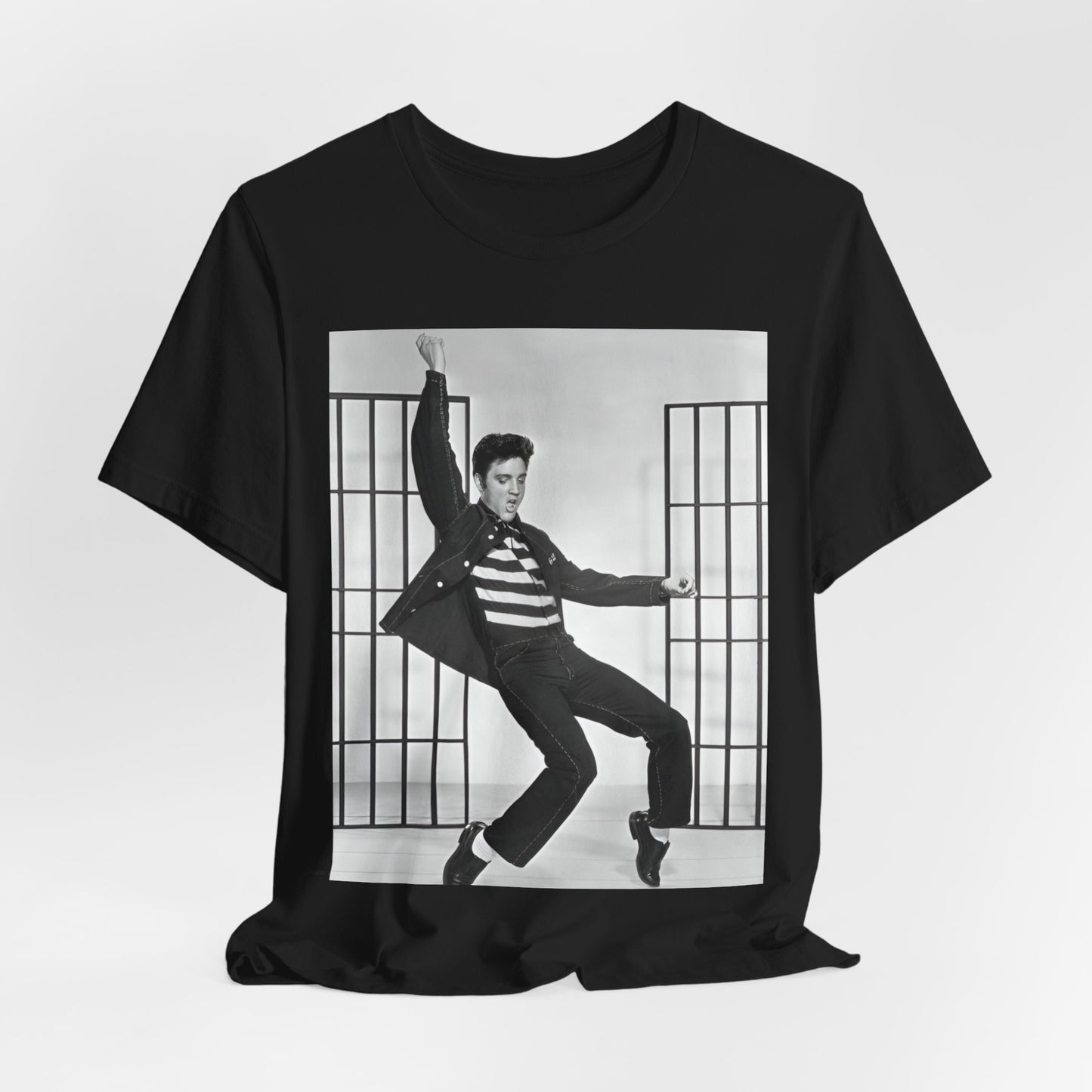 A black graphic t-shirt featuring a graphic related to Elvis Presley's 'Jailhouse Rock' song.