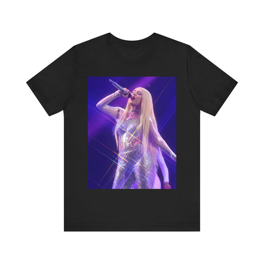 A black graphic t-shirt featuring a photo or illustration of Ava Max performing on stage, with a glittering or sparkling effect.